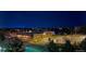 Aerial view of the community at night showing a park and other buildings at 5677 S Park Pl # 311A, Greenwood Village, CO 80111