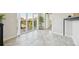 Bright balcony with tile flooring, glass doors, and beautiful views of the surrounding cityscape at 5677 S Park Pl # 311A, Greenwood Village, CO 80111
