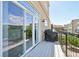 Outdoor balcony with sliding glass doors offers a cozy space for relaxing or entertaining at 5677 S Park Pl # 311A, Greenwood Village, CO 80111