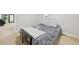 Cozy bedroom with a large bed, carpet, and a neutral color palette for a peaceful retreat at 5677 S Park Pl # 311A, Greenwood Village, CO 80111