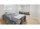 Cozy bedroom features a mirrored closet and plush carpeting at 5677 S Park Pl # 311A, Greenwood Village, CO 80111