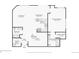 Detailed floor plan of the first floor, showcasing the layout of the living room, kitchen, bedrooms, and bathrooms at 5677 S Park Pl # 311A, Greenwood Village, CO 80111