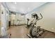 A community gym with an elliptical, bike, and treadmill at 5677 S Park Pl # 311A, Greenwood Village, CO 80111