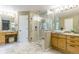 Bathroom boasting a large walk-in shower and dual vanities at 2204 Lasalle St, Superior, CO 80027