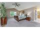 Serene main bedroom with vaulted ceiling, large window, and access to the ensuite bathroom at 2204 Lasalle St, Superior, CO 80027
