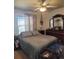 Guest bedroom with ensuite bath and dresser at 6255 Wolf Creek Rd, Strasburg, CO 80136