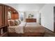 Bright main bedroom featuring built in wardrobe and storage at 7040 Routt St, Arvada, CO 80004