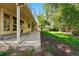 Backyard featuring a patio, lawn, and mature landscaping at 7548 S Crocker Ct, Littleton, CO 80120