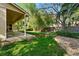 Backyard with mature trees and a well maintained lawn at 7548 S Crocker Ct, Littleton, CO 80120