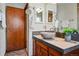 Powder room featuring a stone vessel sink at 7548 S Crocker Ct, Littleton, CO 80120