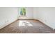 Bright, carpeted bedroom with a sunlit window and ample natural light at 7548 S Crocker Ct, Littleton, CO 80120