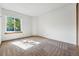 Sun-filled bedroom features neutral carpeting and a window that brings in natural light at 7548 S Crocker Ct, Littleton, CO 80120