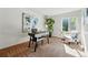 Bright home office with large windows, desk, and chair; an ideal space for work or study at 7548 S Crocker Ct, Littleton, CO 80120