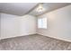 Neutral bedroom with soft carpeting and a bright window providing a serene and comfortable living space at 365 Casalon Pl, Superior, CO 80027