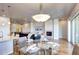 Stylish dining area with an elegant chandelier, seating for six, and open concept design at 365 Casalon Pl, Superior, CO 80027
