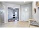 Inviting entryway leading to the office with a white door and neutral color scheme at 365 Casalon Pl, Superior, CO 80027
