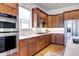 Modern kitchen features stainless steel appliances, granite countertops, and plenty of cabinet space at 365 Casalon Pl, Superior, CO 80027