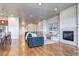 Inviting living room with a fireplace, comfortable seating, and seamless access to other living areas at 365 Casalon Pl, Superior, CO 80027