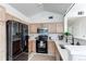 Well-equipped kitchen featuring stainless steel appliances, sleek countertops, and ample cabinet space at 8500 E Jefferson Ave # 7B, Denver, CO 80237