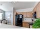 Beautiful kitchen with stainless steel appliances and ample counter space overlooking the dining area at 8500 E Jefferson Ave # 7B, Denver, CO 80237