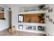 Stylish living room with custom built-ins, wood accents, and a contemporary design aesthetic at 8500 E Jefferson Ave # 7B, Denver, CO 80237