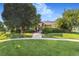 Charming clubhouse with well-maintained landscaping and inviting entrance at 10301 E 112Th Way, Commerce City, CO 80640