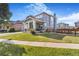Attractive two-story home with a large front lawn, covered porch and beautiful exterior paint at 10301 E 112Th Way, Commerce City, CO 80640