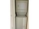 Image displaying a stacked washer and dryer unit in a laundry closet at 2231 Sable Blvd # 909, Aurora, CO 80011