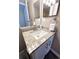 Clean bathroom with granite countertop and updated vanity at 4760 S Wadsworth Blvd # H207, Littleton, CO 80123