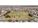 Community aerial featuring a large green space perfect for outdoor activities and neighborhood gatherings at 9758 Laredo St # 18D, Commerce City, CO 80022