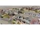 Overhead view of homes with sidewalks and manicured landscaping, offering a walkable neighborhood at 9758 Laredo St # 18D, Commerce City, CO 80022