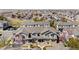Neighborhood view of well-maintained townhomes with neat landscaping and easy access to local amenities at 9758 Laredo St # 18D, Commerce City, CO 80022