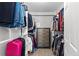 Walk-in closet with hanging racks, shelving, and drawers at 9758 Laredo St # 18D, Commerce City, CO 80022