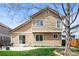Backyard view showing patio, grassy area, and the home's exterior siding at 12552 Tammywood St, Broomfield, CO 80020