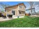 Inviting backyard with patio, lush lawn, and comfortable outdoor seating arrangement at 12552 Tammywood St, Broomfield, CO 80020