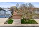 Aerial view showcasing a well-kept two-story home with a lush front lawn at 12552 Tammywood St, Broomfield, CO 80020