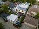 Aerial view of property features a pergola, hot tub, and modern white construction at 2475 S Saint Paul St, Denver, CO 80210