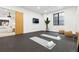 Bright exercise room with ample space for yoga and fitness activities at 2475 S Saint Paul St, Denver, CO 80210