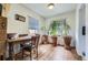 Bright dining room with hardwood floors and natural light, perfect for comfortable Gathering meals at 10040 W 13Th Pl, Lakewood, CO 80215