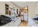Functional kitchen with an adjacent laundry area, offering convenience and practicality in a compact space at 10040 W 13Th Pl, Lakewood, CO 80215