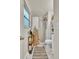 Modern bathroom with walk-in shower, white toilet, and decorative accents at 3163 S Boston Ct, Denver, CO 80231
