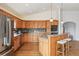 Updated kitchen with granite countertops and modern stainless appliances at 5990 W 8Th Ave, Lakewood, CO 80214