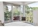 Bright bedroom with access to a private balcony and an outdoor swing seat at 2758 W 22Nd Ave, Denver, CO 80211