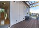 Relax on the spacious balcony with wood decking and seating, perfect for enjoying the outdoors at 2758 W 22Nd Ave, Denver, CO 80211