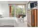 Cozy bedroom boasts a ceiling fan, and access to a private outdoor balcony at 2758 W 22Nd Ave, Denver, CO 80211