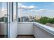 Amazing Denver skyline views from this private balcony through floor-to-ceiling window. Enjoy a modern and bright living space at 2758 W 22Nd Ave, Denver, CO 80211