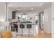 Modern kitchen featuring sleek countertops, stainless steel appliances, and breakfast bar seating at 2758 W 22Nd Ave, Denver, CO 80211
