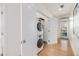 Convenient laundry area featuring a stacked washer and dryer, maximizing space and efficiency at 2758 W 22Nd Ave, Denver, CO 80211