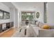 Inviting living room with hardwood floors, neutral decor, and large windows at 2758 W 22Nd Ave, Denver, CO 80211