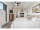 Bright main bedroom with a fireplace, ceiling fan, and modern decor at 2758 W 22Nd Ave, Denver, CO 80211
